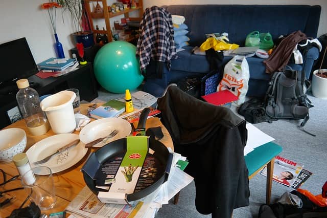 Junk Items Yellow Jacket Takes a messy living room and kitchen table with dirty dishes and clutter