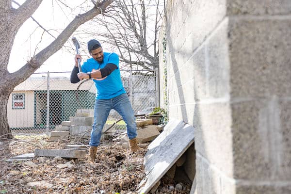 light demolition expert on job site