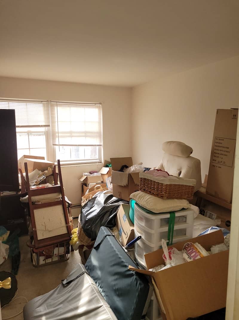 cluttered apartment before junk removal in montgomery county pa