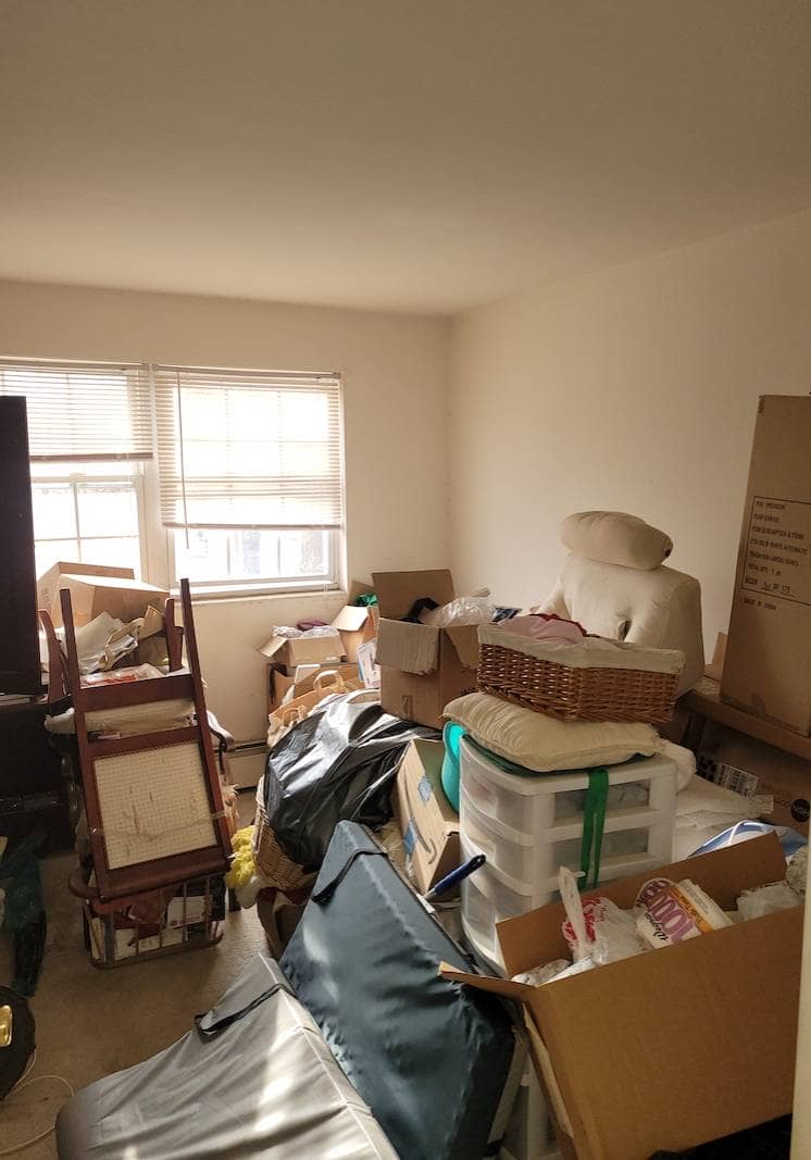 cluttered apartment before junk removal in montgomery county pa