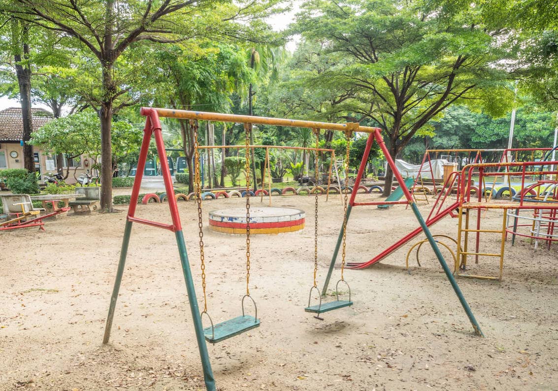 worn out metal outdoor playground before removal